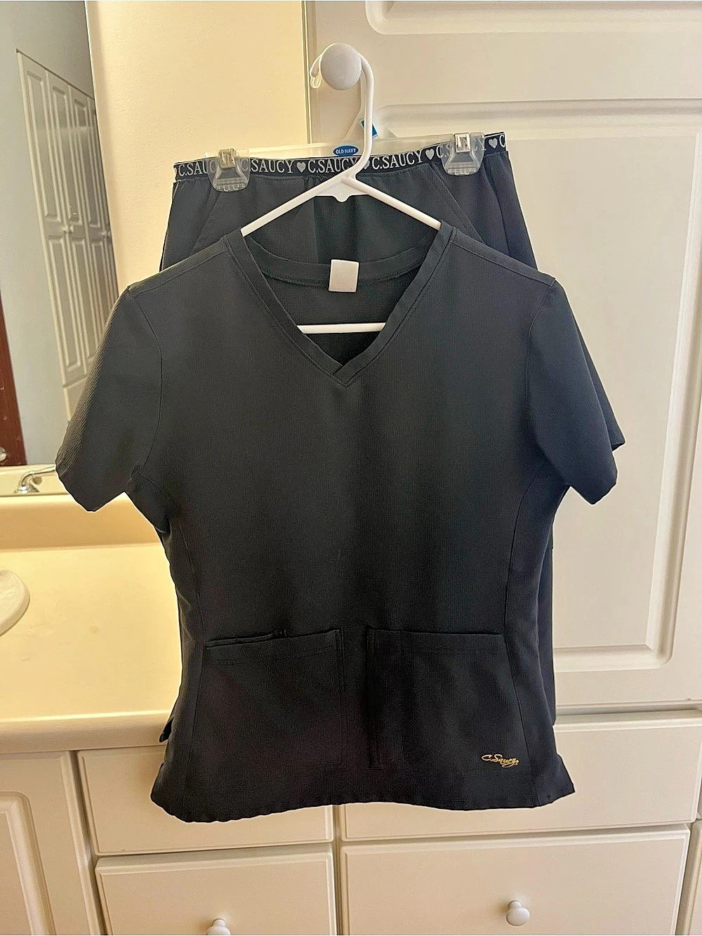 C. Saucy Original Scrub Top Black Scrub Set Size XS
